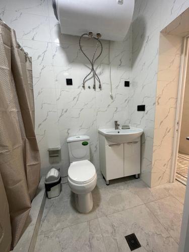 Koupelna v ubytování BUGU Guest House