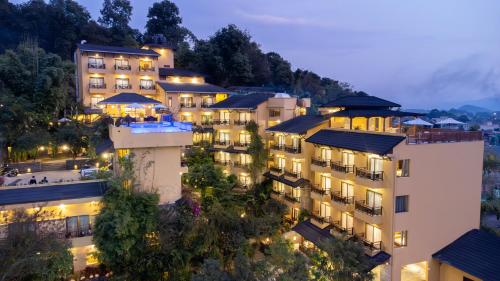 an aerial view of a hotel at night at Bar Peepal Resort in Pokhara