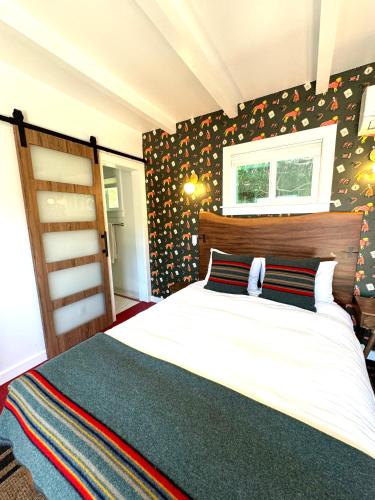 a bedroom with a large bed in a room at Charismatic Downtown Solvang Pet-Friendly Studio in Solvang