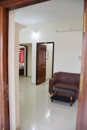 Ruang duduk di Sri Aruna Residency AC