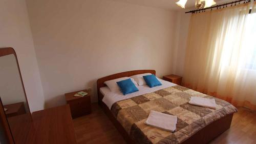 Postel nebo postele na pokoji v ubytování Apartment in Malinska 12
