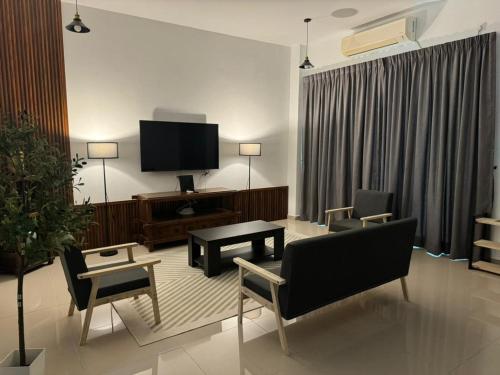 Μια τηλεόραση ή/και κέντρο ψυχαγωγίας στο Luxury HAZA Homestay