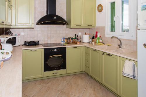 Dapur atau dapur kecil di Reina Villa