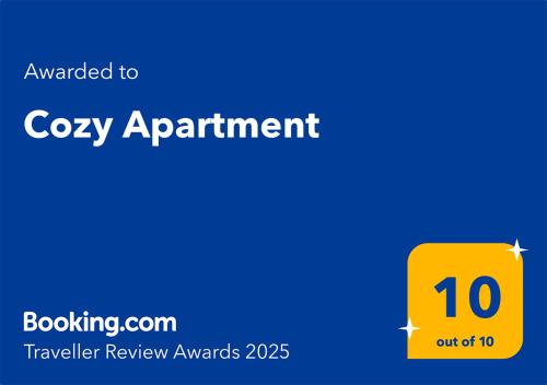 a yellow box with the textouched to cozy appointment at Cozy Apartment in Bucharest