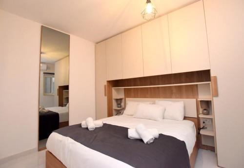 Letto o letti in una camera di 2 bedroom Flat close to Valletta & Sliema - Orion 1