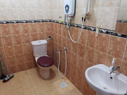 Koupelna v ubytování Homestay Rumah Rehat Seri Anggerik