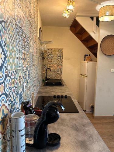 Kuchyň nebo kuchyňský kout v ubytování Appartement T2 La Saline Les Bains