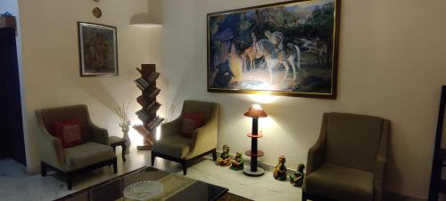 Posezení v ubytování Roots Ashiana