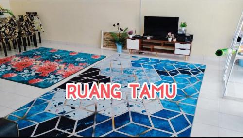 Μια τηλεόραση ή/και κέντρο ψυχαγωγίας στο Zunnurain Homestay