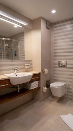 Koupelna v ubytování Hotel Wolin
