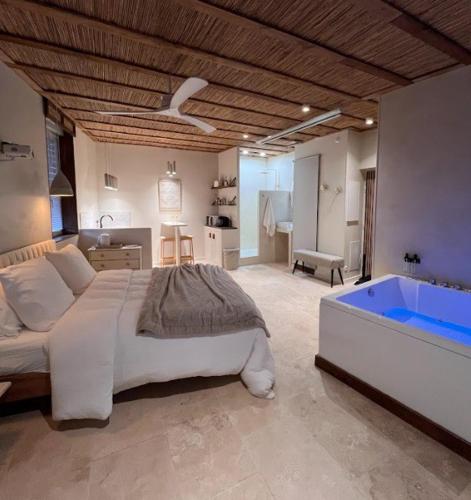 Ένα ή περισσότερα κρεβάτια σε δωμάτιο στο Loft Balneo