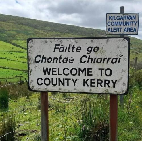 a sign that reads fairlie go chateau chateau welcome to county at Sheepviewhouse Jamie in Kilgarvan