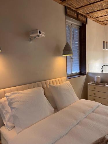 Ένα ή περισσότερα κρεβάτια σε δωμάτιο στο Loft Balneo