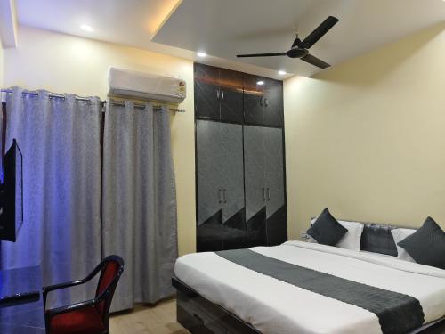 Cama o camas de una habitación en Kartikey Home Stay