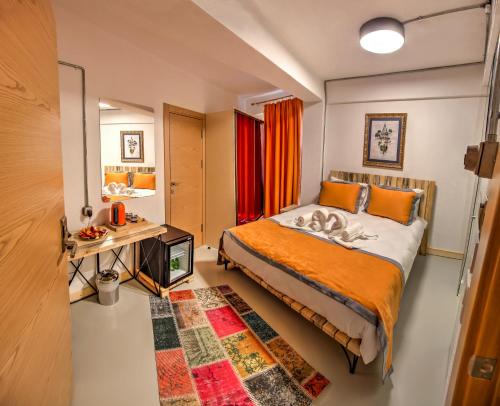 Una cama o camas en una habitación de Vavien Hotel