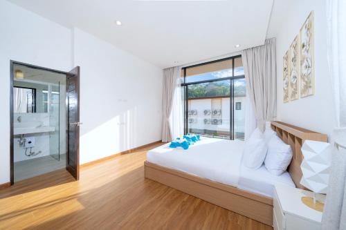 Katil atau katil-katil dalam bilik di Goldena Twin Private Pool Villas