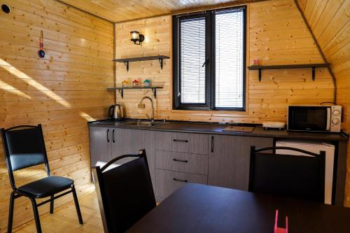 Kuchyň nebo kuchyňský kout v ubytování Cottage Dola Kazbegi