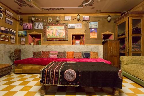 a bedroom with a large bed in a room at Yogis Guest House in Jodhpur