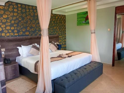 Postel nebo postele na pokoji v ubytování Jaqanaz Resort