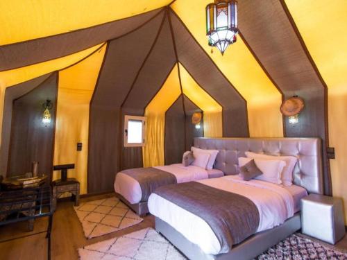 Postel nebo postele na pokoji v ubytování Global Luxury Camp