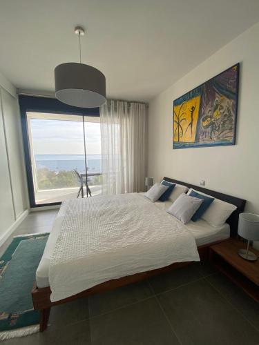 Ένα ή περισσότερα κρεβάτια σε δωμάτιο στο Luxury Penthouse best sea views in Blue Suite 5302