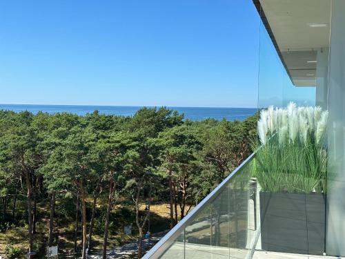 Hevenia Apartament 75 z bocznym widokiem na morze