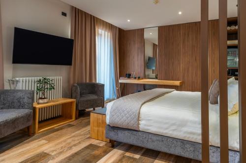 Postel nebo postele na pokoji v ubytování Hotel Iris