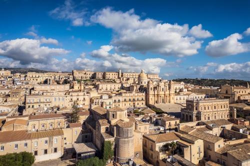an aerial view of a city with buildings at My Lovely Place Noto in Noto