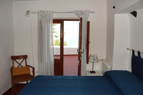 Postel nebo postele na pokoji v ubytování Casa Papuzza e Casa Lucilla