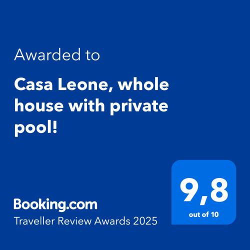 a screenshot of a cell phone with the text awarded to casa leona at Casa Leone, whole house with private pool! in Atsipopoulo