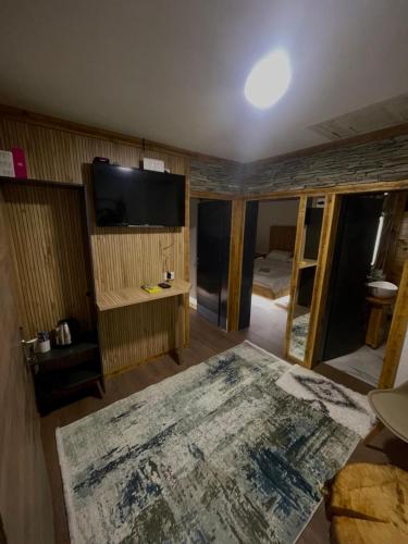 Una cama o camas en una habitación de Rustic House