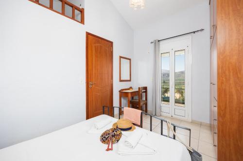 Ένα ή περισσότερα κρεβάτια σε δωμάτιο στο Villa Dimitris
