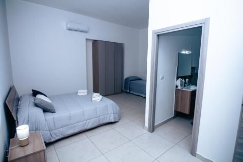 Ένα ή περισσότερα κρεβάτια σε δωμάτιο στο Bed in Italy