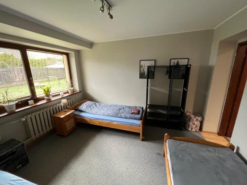 Postel nebo postele na pokoji v ubytování Apartament MATI