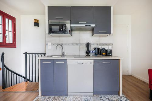 Dapur atau dapur kecil di Résidence ORLY