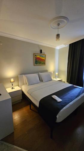 Katil atau katil-katil dalam bilik di Sever Hotel