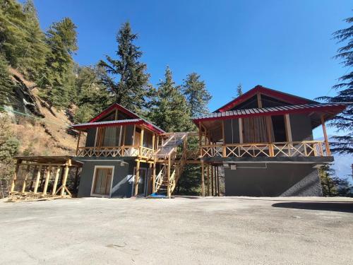 a house that is being constructed with a lot at Shreya cozy hut in Sainj