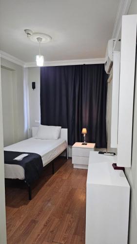 Katil atau katil-katil dalam bilik di Sever Hotel