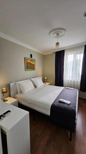 Katil atau katil-katil dalam bilik di Sever Hotel