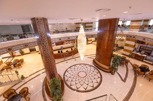 Restaurace v ubytování فندق شركه مدن الخير الفندقيه