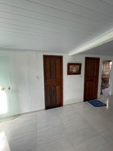 Ένα ή περισσότερα κρεβάτια σε δωμάτιο στο Casa Simples 2 Quartos Privada