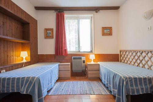 Ένα ή περισσότερα κρεβάτια σε δωμάτιο στο Casa Furrer