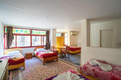 Postel nebo postele na pokoji v ubytování Venus Hotel Luxor 日本人 大歓迎