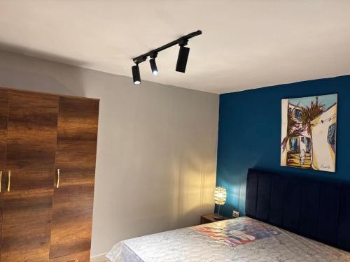Postel nebo postele na pokoji v ubytování Location Megrine