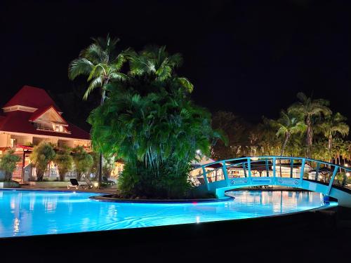 Kolam renang di atau dekat dengan Appartement village Pierre et vacances vue mer Guadeloupe St Anne