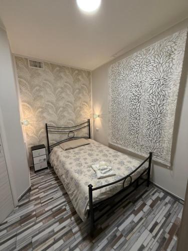 Postel nebo postele na pokoji v ubytování B&B Le Mura