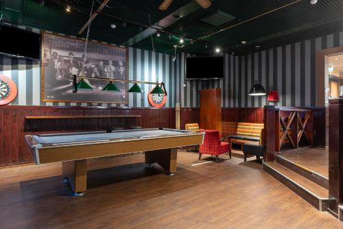 a billiard room with a pool table in it at Original Sokos Hotel Vantaa in Vantaa