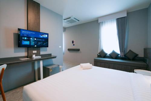 Katil atau katil-katil dalam bilik di One Budget Hotel Lampang Phahonyothin