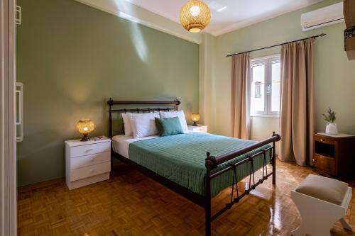 Ένα ή περισσότερα κρεβάτια σε δωμάτιο στο Chrysallida Apartment