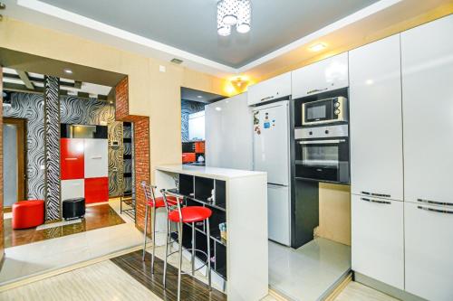 Kuchyň nebo kuchyňský kout v ubytování Old City Escape -One Bedroom